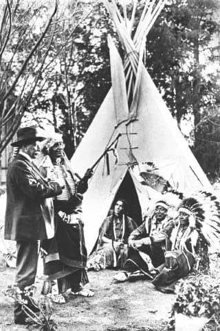 James H. Cook and Chief Standing Bear at Agate around 1922